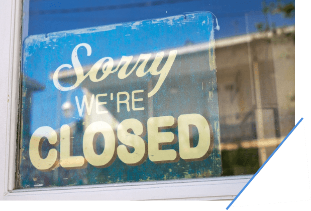 Sorry We're Closed Sign in Window
