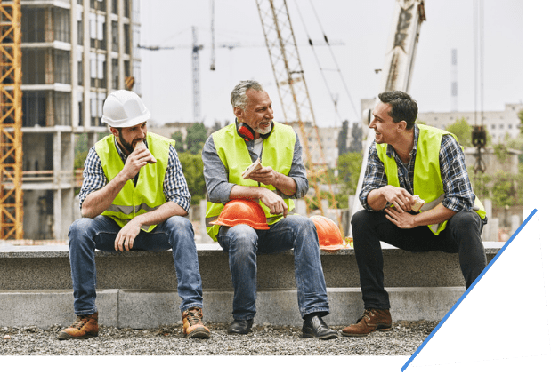 A construction crew eating lunch together.